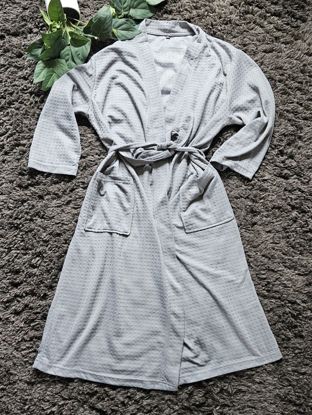 Grey waffle-knit robe, a lightweight and versatile garment typically used for lo
